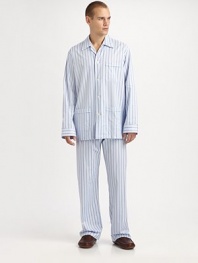A luxurious cotton two-piece set, soft enough to lounge around in all night and day. Machine wash. Imported.SHIRTButtonfrontSpread collarChest, waist patch pocketsPANTSFlat-front styleAdjustable two-button waistSide elastic waist insetsNo flyInseam, about 31