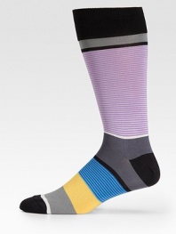 Soft and stretchy in a superior cotton knit with bold stripes allover.Mid-calf height80% cotton/20%nylonMachine washImported