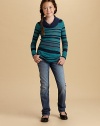 Jazzy stripes and a soft rib-knit turtleneck mean this top will be her go-to favorite.Soft rib-knit foldover turtleneckLong sleevesScooped hemRayonHand washMade in USAAdditional InformationKid's Apparel Size Guide 