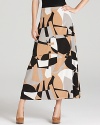 Slip on this DKNY printed stretch silk maxi skirt when your outfit can use a dose of modern, artistic edge.