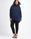 Almost too-chic-to-be-true, an easy-fitting, oval silhouette in plush merino wool. TurtleneckRibbed neck, cuffs and bottomSlash pockets About 29 from shoulder to hem Merino woolHand washImported