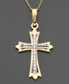 Ecclesiastical beauty. This 14k gold cross pendant is accented with rhodium beads. Chain not included. Approximate drop: 1-1/4 inches.