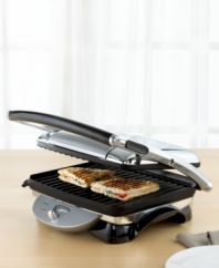 This retro-style panini grill has been featured on the reality show, The Apprentice, as one of the most innovative appliances one could own today. Perfect for quick and easy meals, you can press creative panini-style sandwiches, plus grill chicken, meat, fish and vegetables in a flash! Full warranty. Model CGH800.