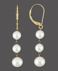 Triple your sophistication with these classy pearl drop earrings. Set in 14k gold, earrings feature three graduated, cultured freshwater pearls (5-6 mm and 6-7 mm). Approximate drop: 1-3/4 inches.