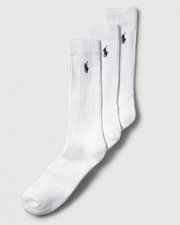 Polo Ralph Lauren set of three stretch cotton crew socks feature a cushioned foot and ribbed top. Polo player embroidered detail. Three pairs of socks per pair.