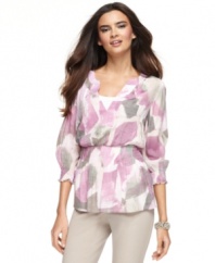 Smocked at the waist and sleeves, this petite blouse from Alfani features a beautiful silhouette and a print that's a pretty way to usher in spring.