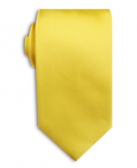 A lustrous solid tie is the perfect worry-free complement to your sophisticated office attire.