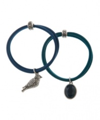 Just wing it. A beautiful bird and glamorous crystal accents adorn this stylish set of elastic hair bands from Lucky Brand. Made in plastic, they're set in silver tone mixed metal. Approximate diameter: 1-3/4 inches.
