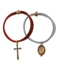 Alluring accessories. Adorned with delicate cross and oval charms, Lucky Brand's hair bands add a decorative detail to your look. The elastic bands include plastic and glass charms with gold tone mixed metal accents. Approximate diameter: 1-3/4 inches.