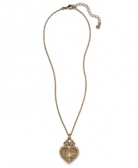 Delightfully decorative. Featuring the initial D, Monet's heart pendant necklace is crafted in gold tone mixed metal and embellished with clear crystal accents. Item comes packaged in a gift box. Approximate length: 16 inches + 2-inch extender. Approximate drop: 1-1/2 inches.