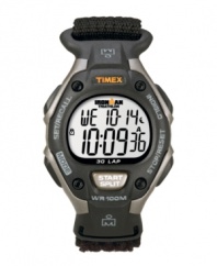 Strap it on and hit the ground running with this digital Ironman watch by Timex. Black Velcro® strap and round gray resin case. Orange logo at bezel. Positive display digital dial features initial time, day, date, seconds and 30-lap memory recall. Quartz movement. Water resistant to 100 meters. One-year limited warranty.