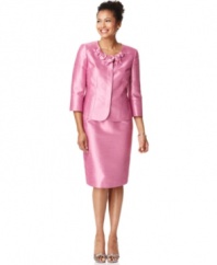 Shimmering shantung makes this skirt suit by Kasper look luxe, while seamed details add a tailored look. A band of fabric flowers at the neck is a pretty finishing touch.
