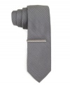 Mix it up with a touch of texture. This slim corduroy tie from Calvin Klein does gives your look a modern twist.