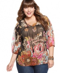 Sheer chiffon and an exotic print give One World's plus size peasant top a global-glam look! Detailed embroidery adds a luxe touch.