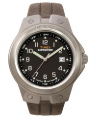 A Timex watch with pleasing design, comfortable fit and practical durability. Tan leather velcro strap and round brushed mixed metal case. Black dial with numerals, logo and date window. Analog movement. Water resistant to 100 meters. One-year limited warranty.