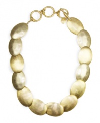 Don't get stressed about accessorizing. Turn to this distressed necklace by Jones New York. Flat disks crafted from gold-plated mixed metal. Approximate length: 18 inches.