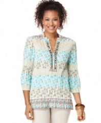 JM Collection's petite top features a beautiful beaded front placket and a crinkled, printed tunic silhouette.