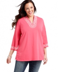 Highlighted by elegant embroidery, Jones New York Signature's three-quarter sleeve plus size tunic top is a must-have for chic casual wear.