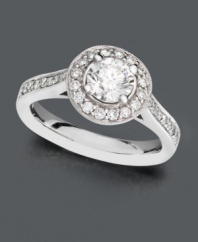 For the always-unique bride-to-be. This beautiful engagement ring features a vintage flair that differs from your average ring. Ring features a round-cut center diamond surrounded by a halo of diamonds and a row of diamonds at each shoulder (1-1/4 ct. t.w.). Ring crafted in 14k white gold.