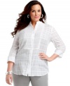 Be classically chic with J Jones New York's three-quarter sleeve plus size shirt, finished by a pintucked bib and tonal pattern.