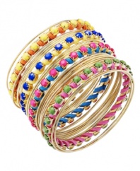 Leave not even an inch uncovered! Bar III's bohemian bracelet set features 29 separate bangles highlighting woven suede strands and bright acrylic beads in hues of pink, orange, blue green, and yellow. Crafted in gold-plated mixed metal. Approximate diameter: 3 inches.