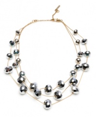 Eye-catching shimmer to spice up any office or weekend look. This Kenneth Cole New York necklace crafted from mixed metal features three strands of intricately faceted silver beads. Approximate Length: 16 inches with 2-inch extender.