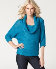 A chunky sweater with a lush cowl neckline is a wardrobe essential, from Calvin Klein Jeans. (Clearance)
