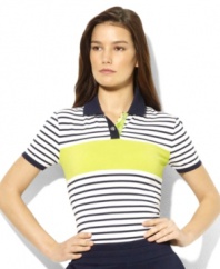 Crafted in sleek stretch jersey for a comfortable fit, this petite Lauren by Ralph Lauren polo is designed with a contrast stripe and signature LRL-embossed snaps for a sporty appeal.