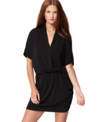 Draping and cute pockets lend plenty of flair to this RACHEL Rachel Roy number.