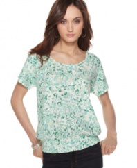 An abstract animal print makes this petite peasant-inspired top a sweet choice for spring, from Calvin Klein Jeans. Rendered in 100% cotton, it's super-comfy and breathable, too!