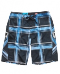 Hit the sand in style. These Volcom board shorts give you the rad plaid style you want.