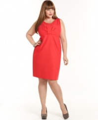 An empire design lends a flattering fit to Tahari Woman's sleeveless plus size dress, finished by a pleated accent. (Clearance)