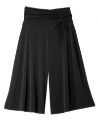 Cool comfort. She'll step out in style and still be comfortable all day long in these plus size gaucho pants from BCX.