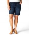 A dark wash lends a flattering finish to Levi's plus size size Bermuda shorts, featuring a tilted rise for fuller back coverage.