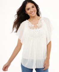 Style&co.'s petite tunic gets a springtime makeover with a romantic sheer fabric and a delicate, rhinestone-trimmed crochet bib!