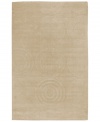 By using a centuries-old technique, craftsmen are able to produce the unique detail and texture of this plush wool rug from Surya's Mystique collection. They work traditional shuttles, then hand-carve and hand-finish the rug in pursuit of high quality and a flawless finish. Carved discs and spirals add subtle style to this elegant, versatile rug.