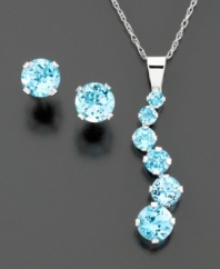 Into the clear blue! Round-cut blue topaz (1-1/3 ct. t.w.) is chicly complemented by 14k white gold. Set features stud earrings and pendant with 1 inch drop and 18 inch chain.