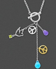 Make a statement through expression. This symbolic peace pendant features iconic peace sign charms and a cut-out dove with faceted amethyst (1 ct. t.w.), blue topaz (2-3/8 ct. t.w.), and square cut peridot (1/8 ct. t.w.). Set in sterling silver with 14k gold accents and a frontal toggle clasp. Approximate length: 18 inches. Approximate drop: 2-3/8 inches.