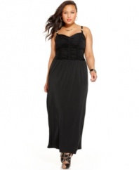 Baby Phat gives the maxi a posh makeover with this sleeveless plus size dress, accented by elegant ruching-- wow them at your special events!