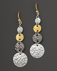 Blending tones of white silver, dark silver and 24 Kt. yellow gold, this triple-drop earring from Gurhan is crafted with flat discs of hammered silver with yellow gold French wire backs.