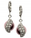 Resplendent and refined. With mauve glass pearls surrounded by sparkling glass accents, Givenchy's elegant drop earrings will add a dressy decorative touch to your wardrobe (both day and evening). Set in silver tone mixed metal. Approximate drop: 1-1/4 inches.