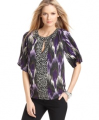 A bold mixed-print makes a chic statement on this MICHAEL Michael Kors top -- a keyhole cutout adds a peekaboo element!