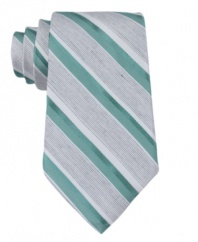Follow the lines in your wardrobe. With sleek stripes, this Calvin Klein tie always keeps it sleek.