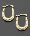 Wear these versatile hoop earrings from work to weekend! Set in 14k white & yellow gold. Approximate drop: 1/2 inch. Approximate diameter: 1/4 inches.