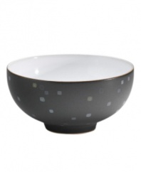 Colorful confetti shines on the Jet Skyline rice bowl like bright city lights. Mix and match with Denby Jet and Jet Stripes to personalize casual tables with modern polish. In microwave- and oven-safe stoneware for easy reheating.