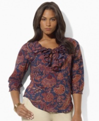 A vibrant paisley pattern and voluminous ruffles make a bright, bold statement on this chic plus size top from Lauren by Ralph Lauren, designed in light-as-air cotton voile with slightly puffed sleeves for a graceful touch.