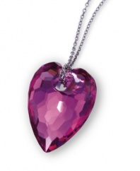Fabulously faceted. Swarovski's galet chrysolite amethyst-hued pendant shines brilliantly with a complex faceted design. Crafted in silver tone mixed metal. Approximate length: 18 inches. Approximate drop: 1 inch.
