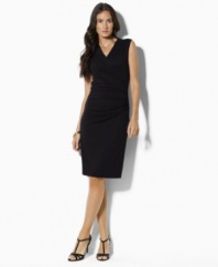 This plus size Lauren by Ralph Lauren dress exudes timeless polish in soft stretch jersey with crisp pressed pleats for a flattering, feminine sheath silhouette that elegantly hugs the body. (Clearance)