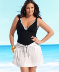 Slip on this plus size cover up for effortlessly chic beach style by J Valdi.