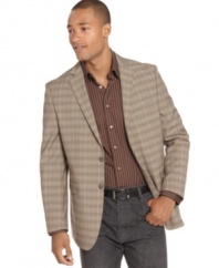 Go bold and pair your patterns. This Sean John plaid blazer makes a statement all its own.
